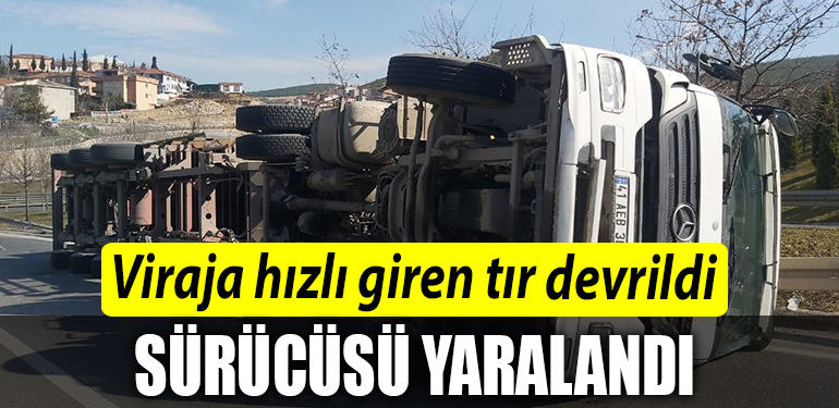 Kocaeli de viraja hizli giren tir devrildi surucusu yaralandi