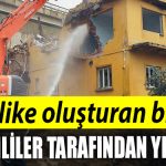 Korfezde tehlike olusturan bina yikildi
