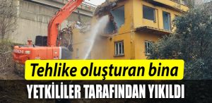 Korfezde tehlike olusturan bina yikildi
