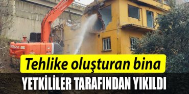 Korfezde tehlike olusturan bina yikildi