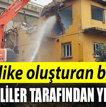 Korfezde tehlike olusturan bina yikildi