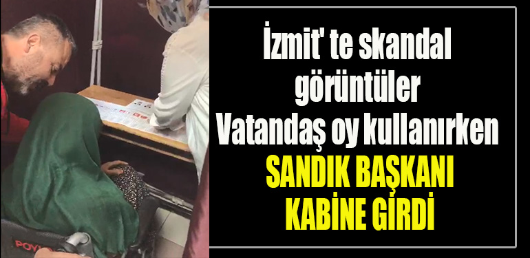 İzmit' te skandal görüntüler. Vatandaş oy kullanırken sandık başkanı kabine girdi