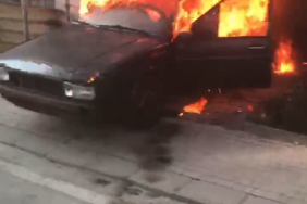 OTOMOBİLİNİ ATEŞE VERDİ